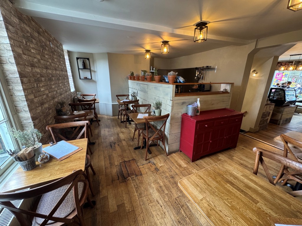 Lot: 46 - PERIOD COMMERCIAL AND RESIDENTIAL HIGH STREET INVESTMENT - Shop - rear section showing counter